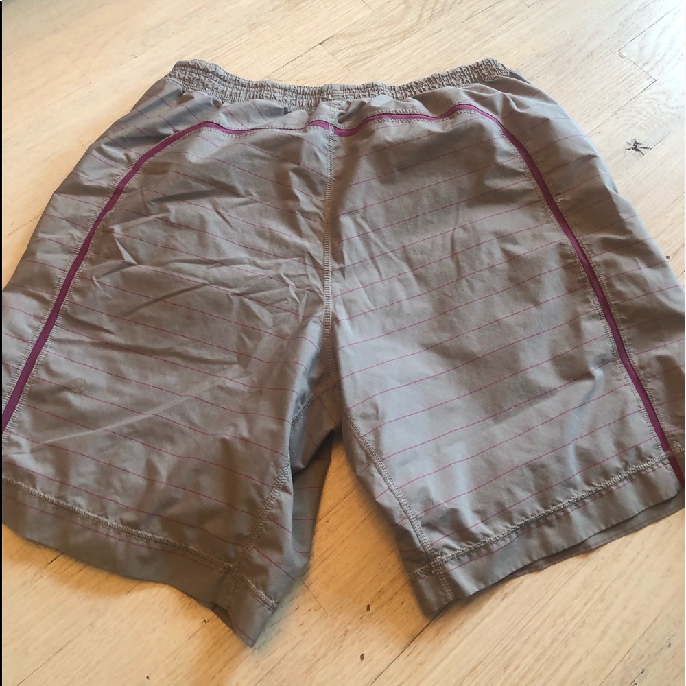 Lululemon workout shorts. Grey w magenta piping